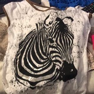 Is a zebra shirt and is from copper key